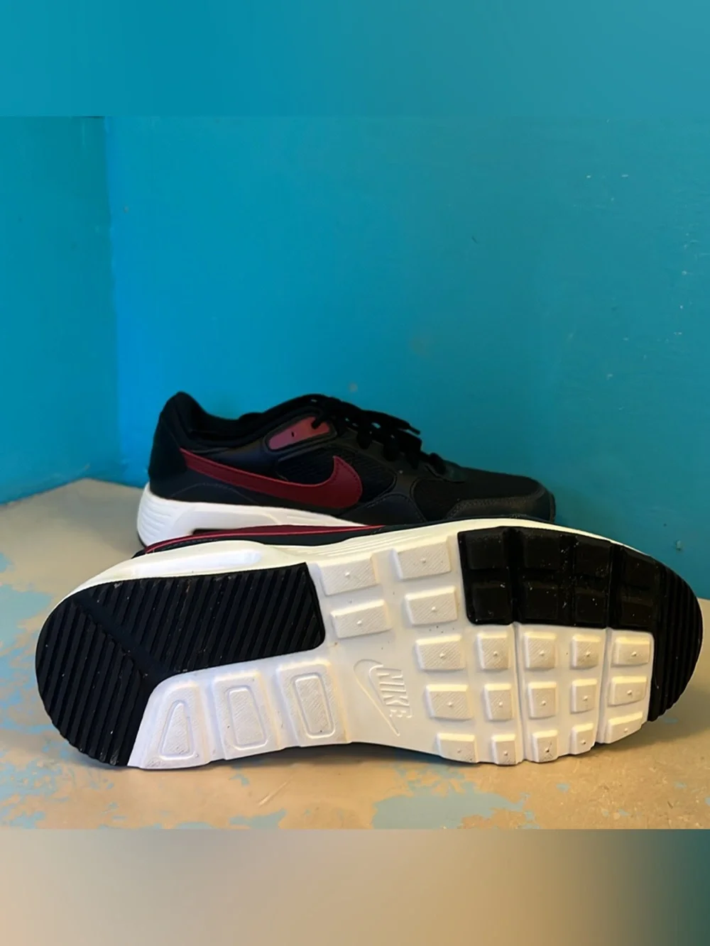 Nike Black Sneakers with Burgundy Swoosh and White Midsole